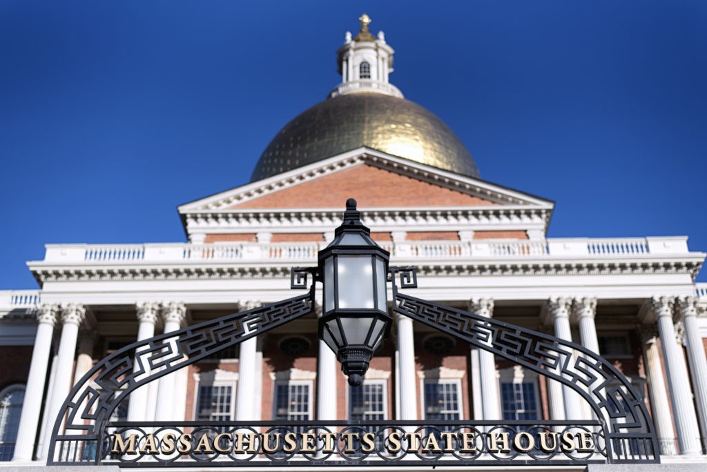 The Massachusetts state house located on the Boston Commons in Boston Massachusetts in the morning sunlight